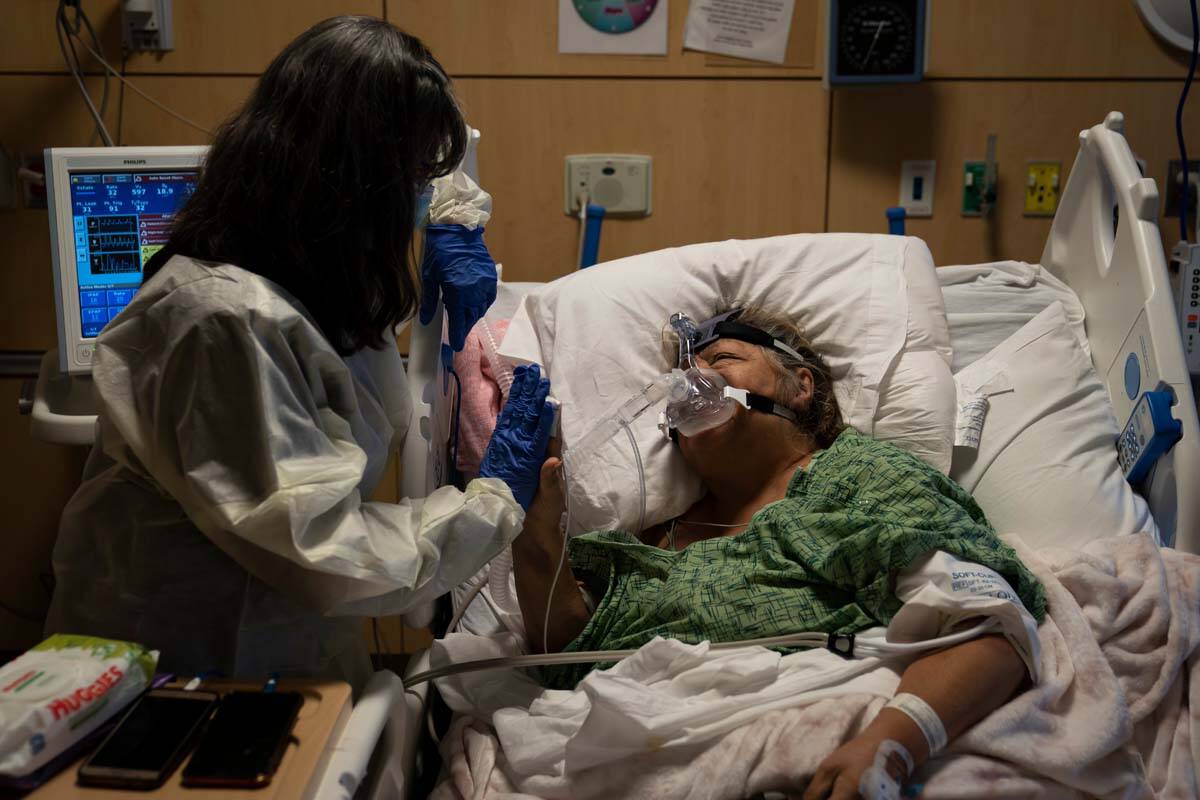 Becky Gonzalez, left, and her long time friend, Mary Lou Samora, a 71-year-old COVID-19 patient ...