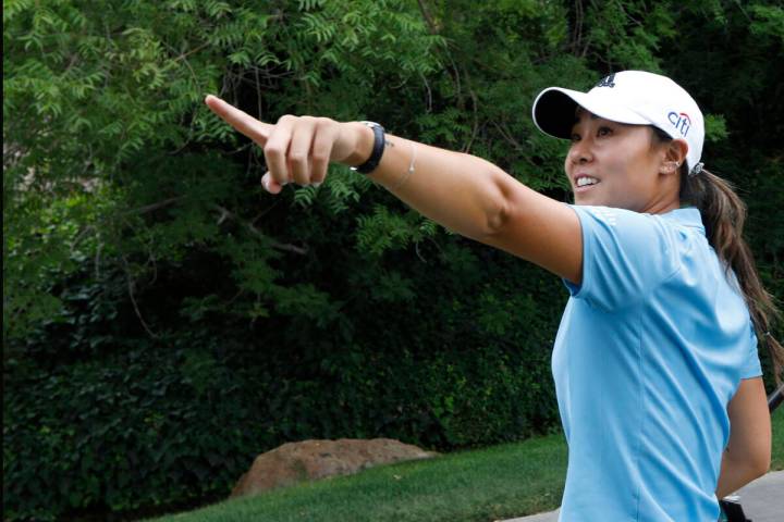 Danielle Kang gestures after finishing the 18th hole during the fourth round of the Bank of Hop ...