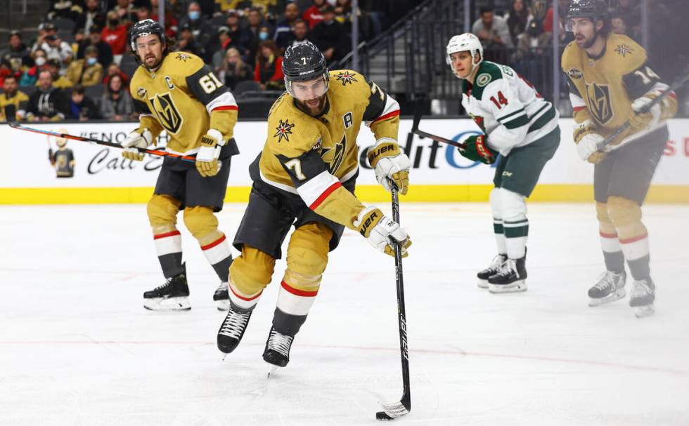 Golden Knights defenseman Alex Pietrangelo (7) skates with the puck during the second period of ...