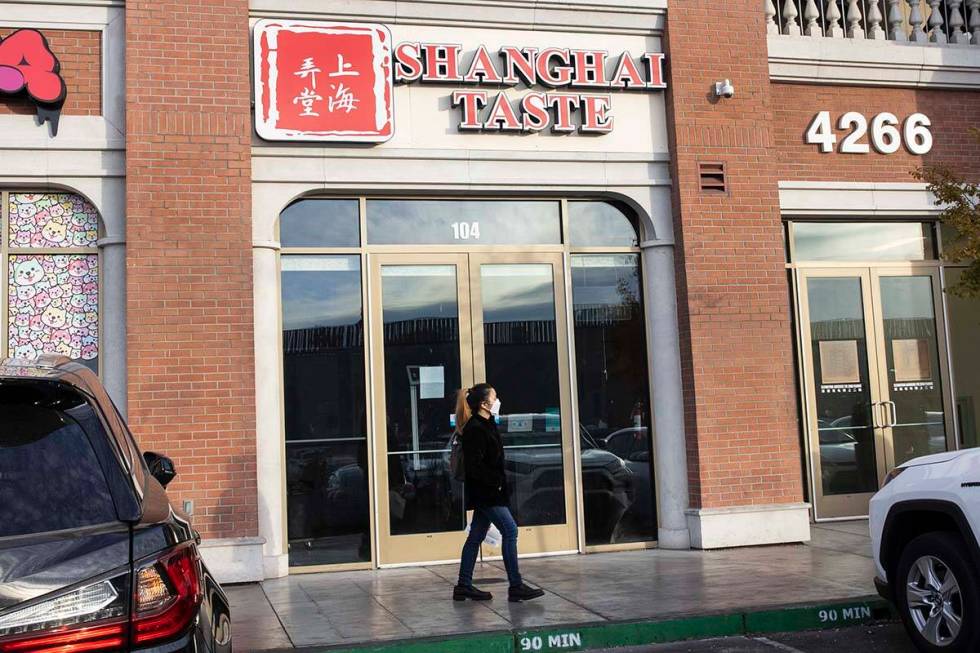 A pedestrians walks past Shanghai Taste at 4255 Spring Mountain Road in China Town on Monday, D ...