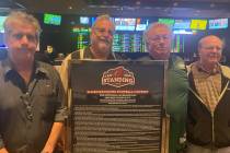 Malcolm Weiss, second from left, and Richard Parsels, second from right, split the $150,000 pri ...