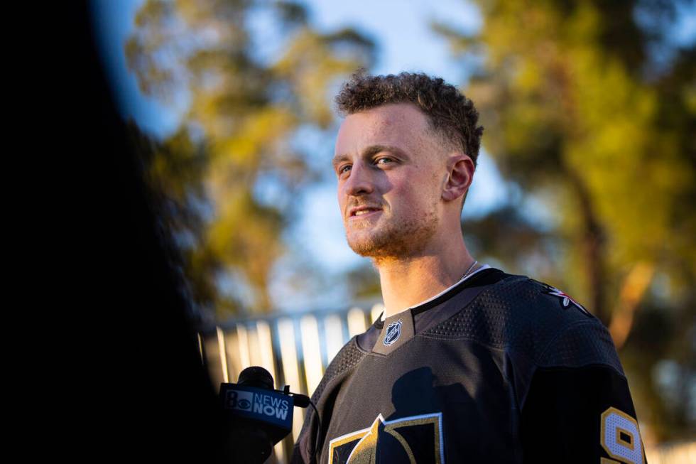 Newly acquired Golden Knights center Jack Eichel talks with members of the media during a break ...