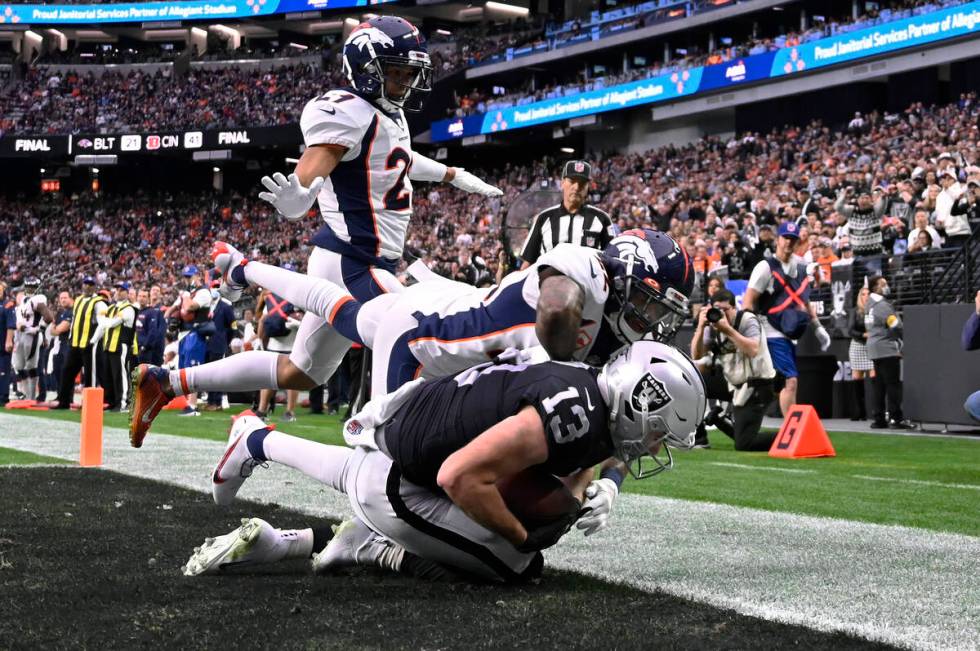 Las Vegas Raiders wide receiver Hunter Renfrow (13) catches a pass for a touchdown against Denv ...