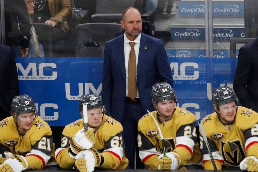 Golden Knights coach Pete DeBoer watch his players during the third period of an NHL hockey gam ...