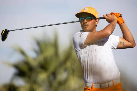 Rickie Fowler hits the ball from the 12th tee box during the final round of the CJ Cup golf tou ...