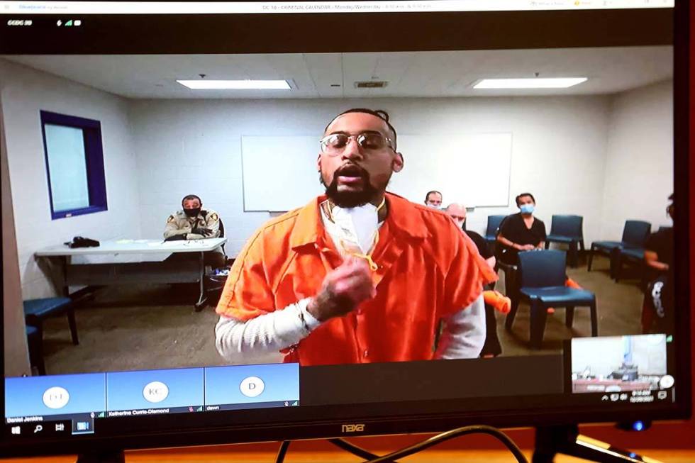 James Hull appears in court via videoconference for sentencing on a weapons charge at the Regio ...