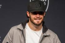 Raiders quarterback Derek Carr speaks with the media during a postgame news conference after th ...
