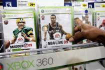 Electronic Arts games for the XBox 360 on display at Best Buy in Mountain View. Calif., Wednesd ...