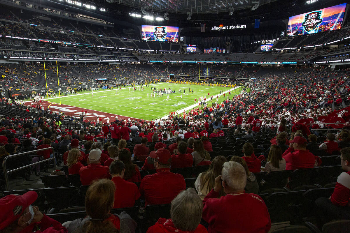 The Wisconsin Badgers fan section looks out on the field at Allegiant Stadium before the Las Ve ...