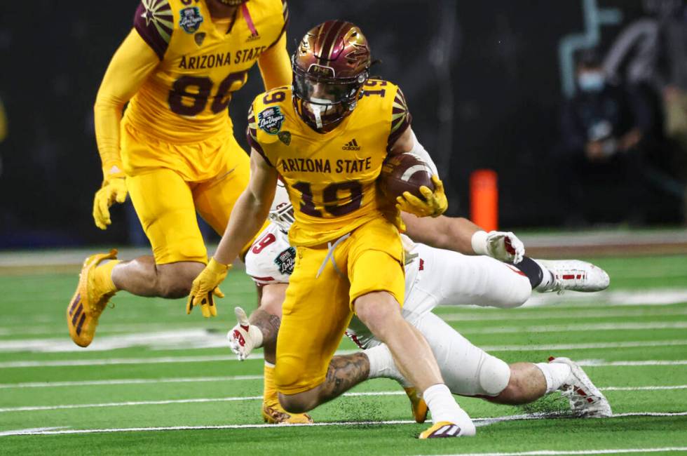 Arizona State Sun Devils wide receiver Ricky Pearsall (19) runs the ball against the Wisconsin ...