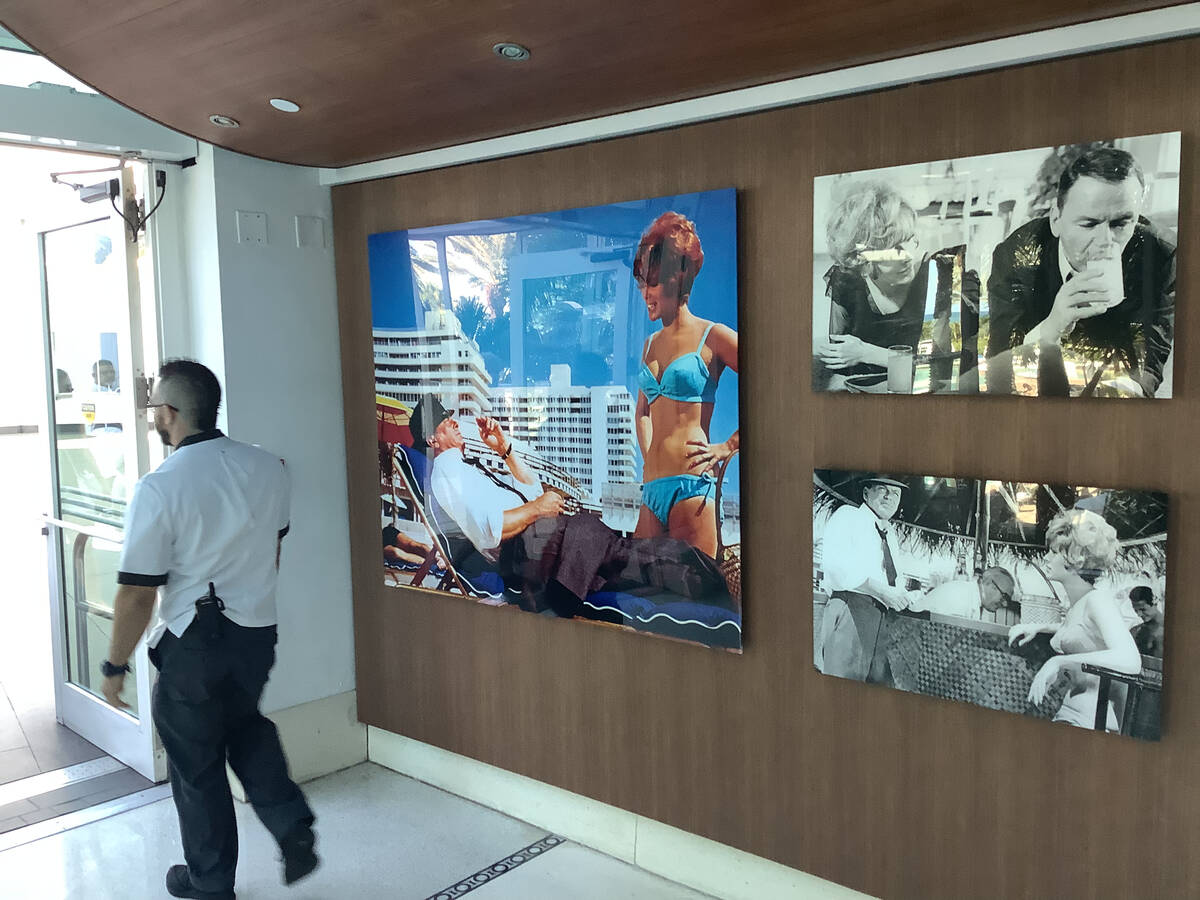A corridor with pictures of Frank Sinatra at the Fontainebleau Miami Beach hotel in Florida is ...