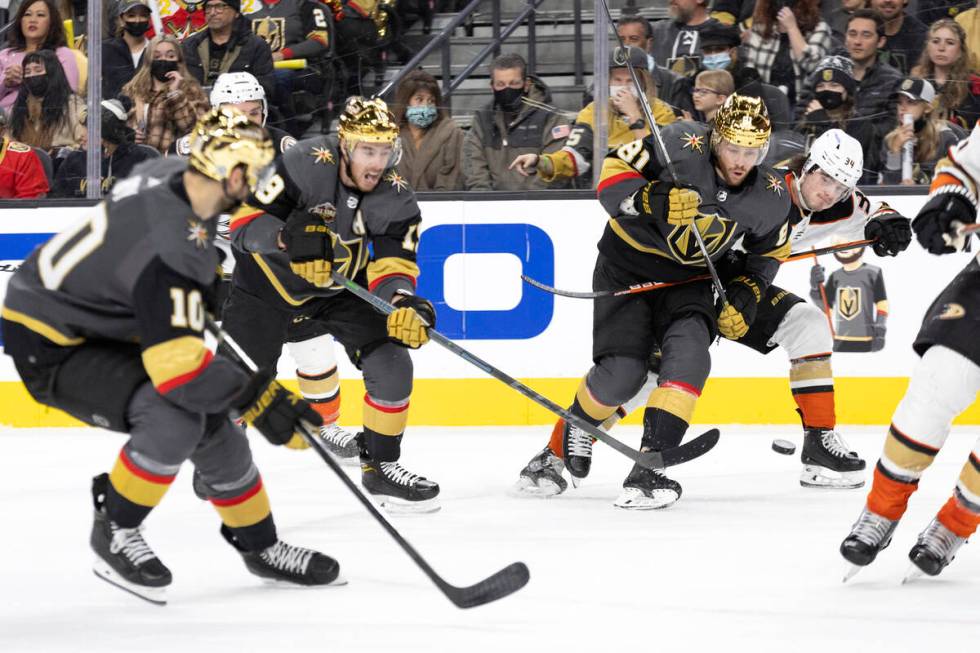 Golden Knights right wing Reilly Smith (19) takes a shot on goal while center Nicolas Roy (10) ...
