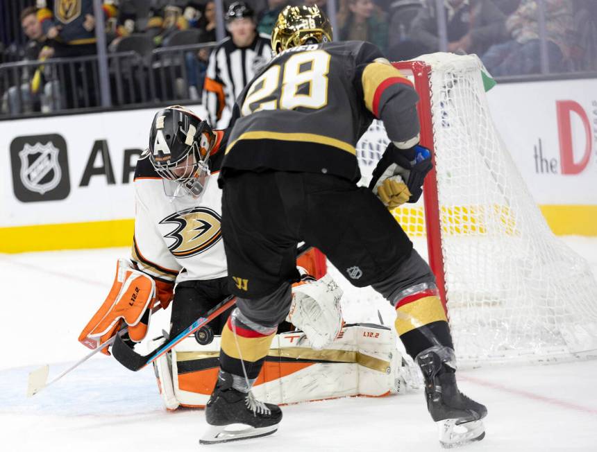 Golden Knights left wing William Carrier (28) takes a shot on Ducks goaltender John Gibson (36) ...