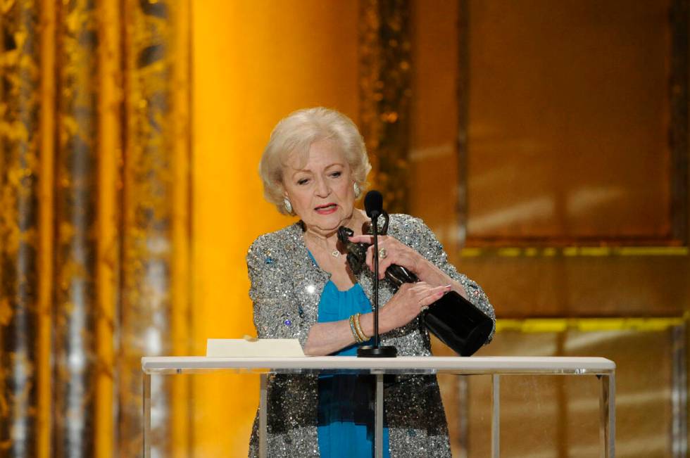 Betty White accepts the award for best female actor in a comedy series for "Hot in Clevela ...