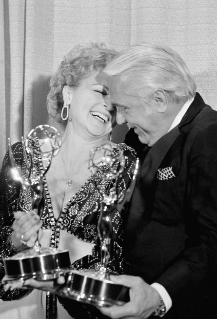 Betty White shares a moment backstage at the 28th annual Emmy Awards with Ted Knight after they ...
