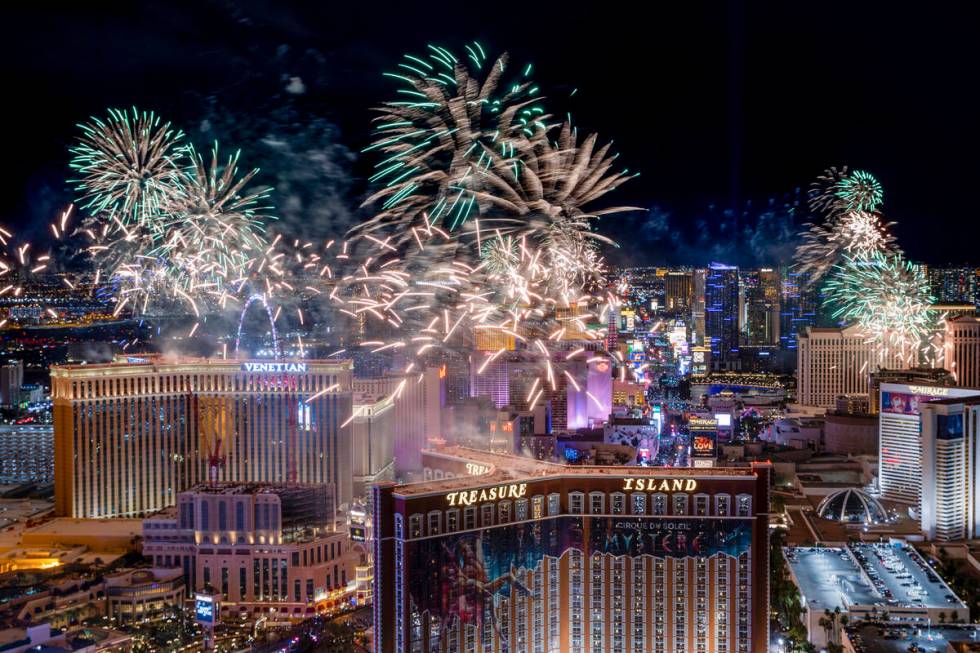 Fireworks explode over the Strip during New Year’s Eve celebrations on Saturday, Jan. 1, 2022 ...