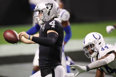 Raiders quarterback Derek Carr (4) runs for a touchdown against the Indianapolis Colts in the f ...