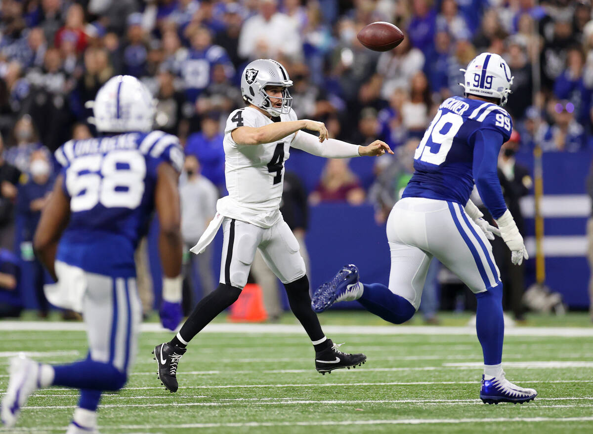 Raiders quarterback Derek Carr (4) throws a pass against the Indianapolis Colts in the first ha ...