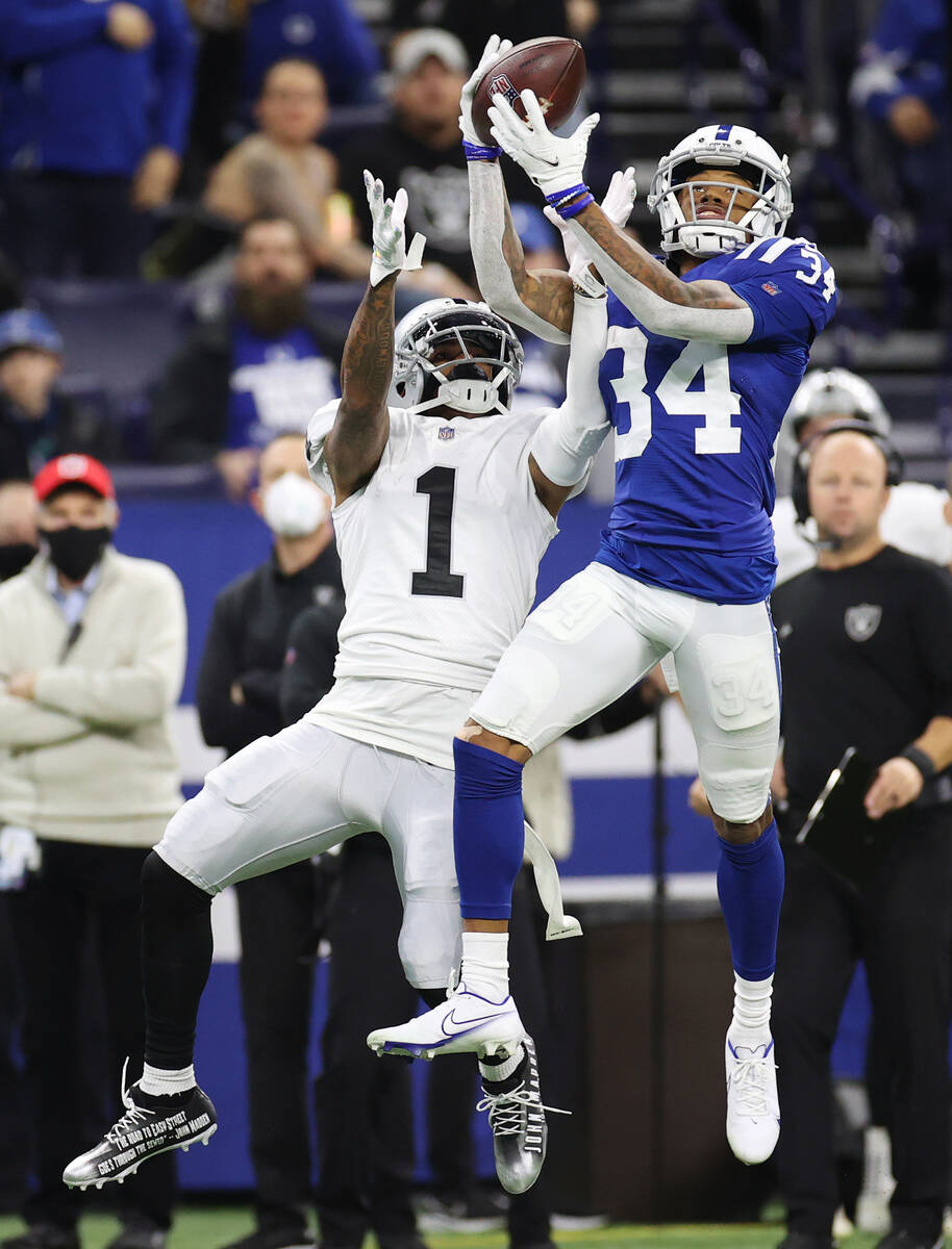 Indianapolis Colts cornerback Isaiah Rodgers (34) intercepts a ball intended for Raiders wide r ...