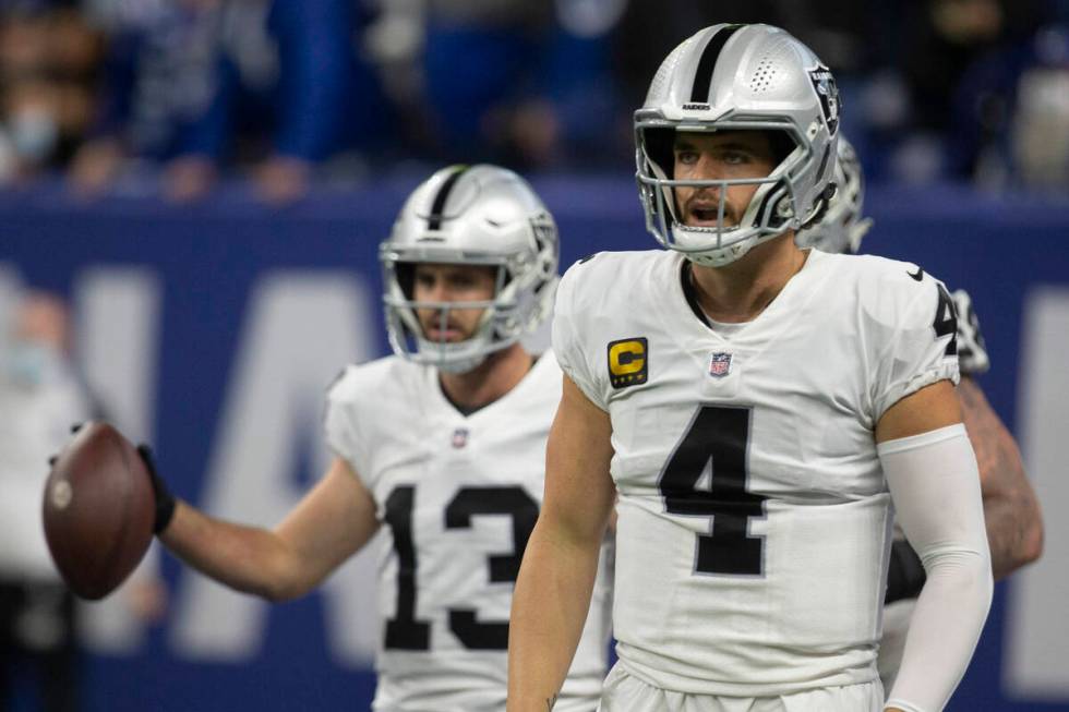 Raiders quarterback Derek Carr (4) celebrates after throwing a touchdown, a call that was later ...