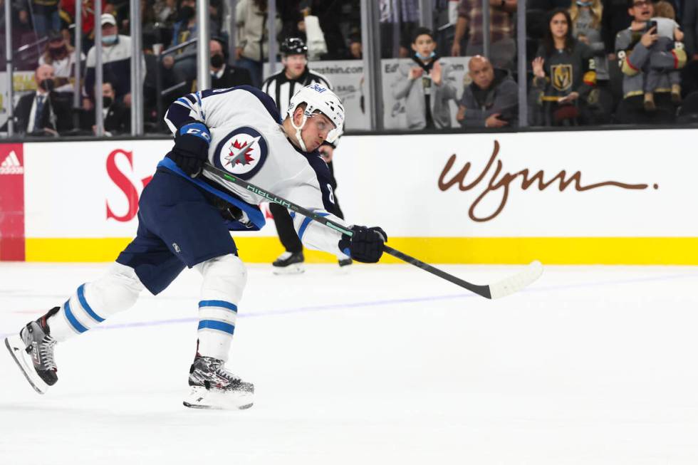 Winnipeg Jets defenseman Nate Schmidt (88) shoots the puck against the Golden Knights during ov ...