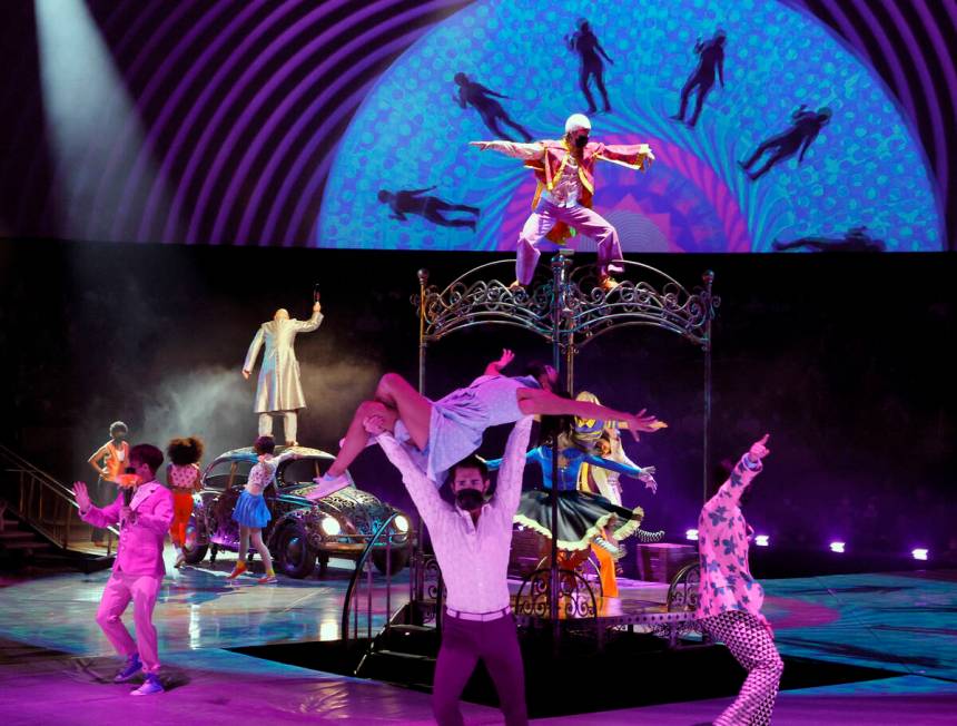 Cast members perform during the grand reopening of "The Beatles LOVE By Cirque du Soleil" at Th ...
