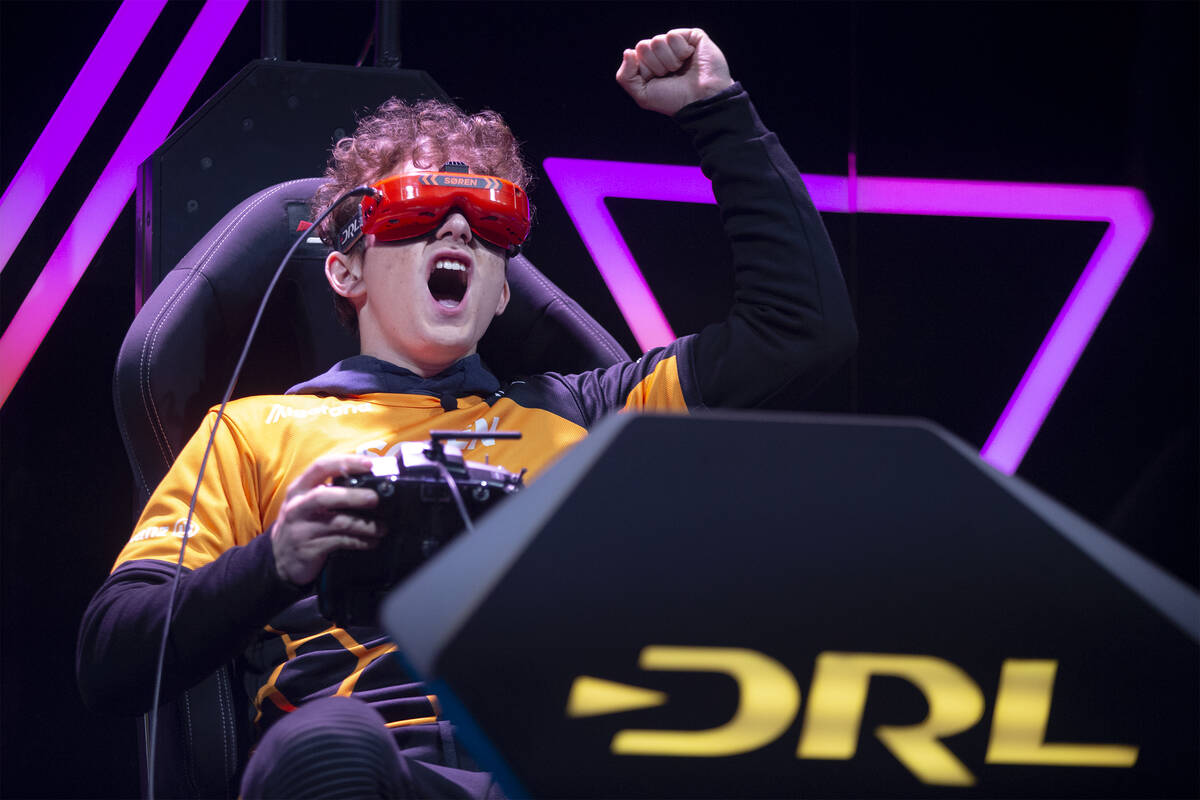 Soren, an 18-year-old drone pilot from Vermont, cheers as he wins a semifinal race during the D ...