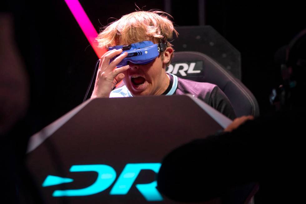 Drone pilot Headsup cheers as he wins a semifinal race during the Drone Racing League Champions ...