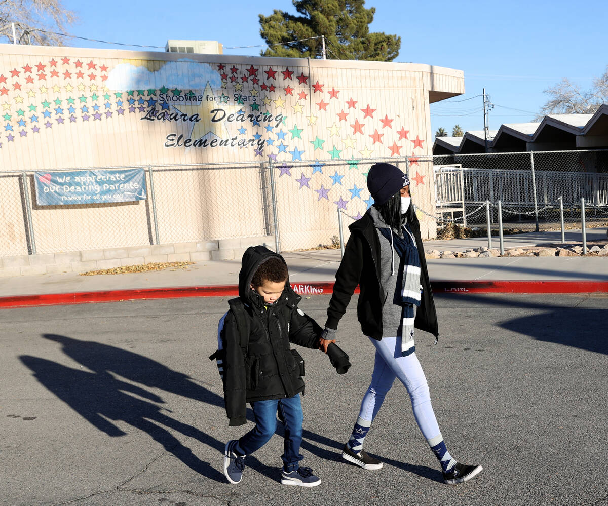 Carlinda Napoleon drops her son Kashawne, 8, off at Dearing Elementary in Las Vegas on the firs ...