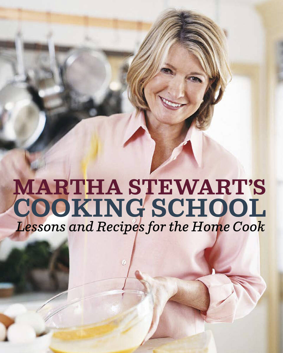 This photo shows the cover of "Martha Stewart's Cooking School," by Martha Stewart. (AP Photo/C ...