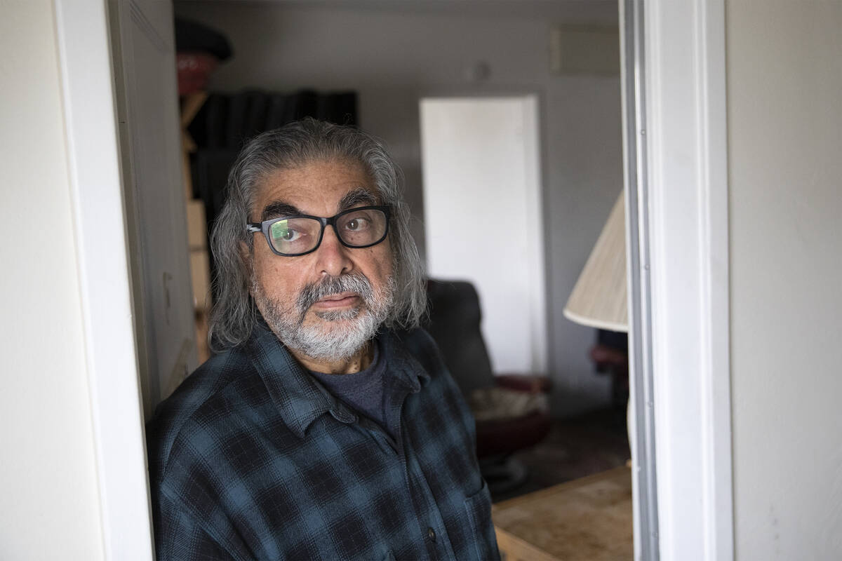 Richard Campos, 72, a resident of Desert Plaza Apartments, in his doorway on Tuesday, Dec. 21, ...