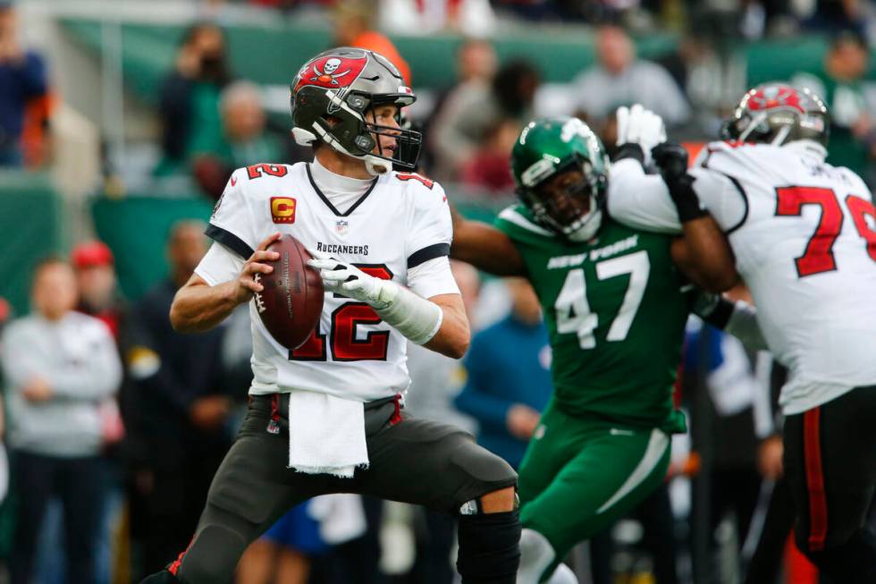 Tampa Bay Buccaneers quarterback Tom Brady throws during the first half of an NFL football game ...