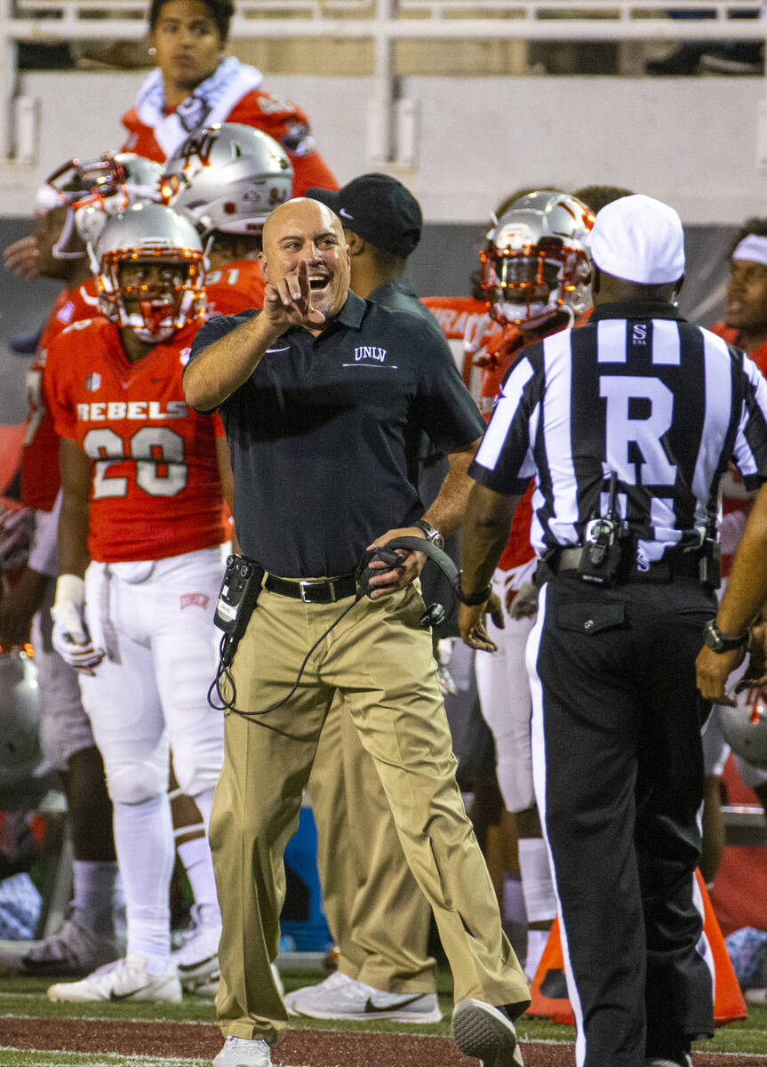 UNLV Head Coach Tony Sanchez argues with a referee versus Southern Utah during the first half ...