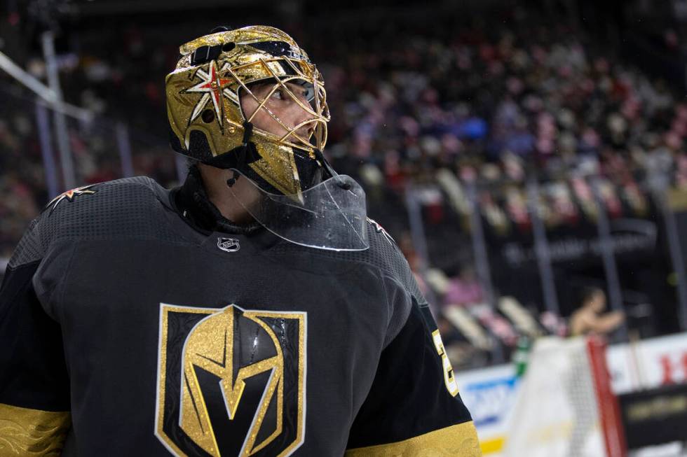 Golden Knights goaltender Marc-Andre Fleury (29) skates around the goal during the second perio ...