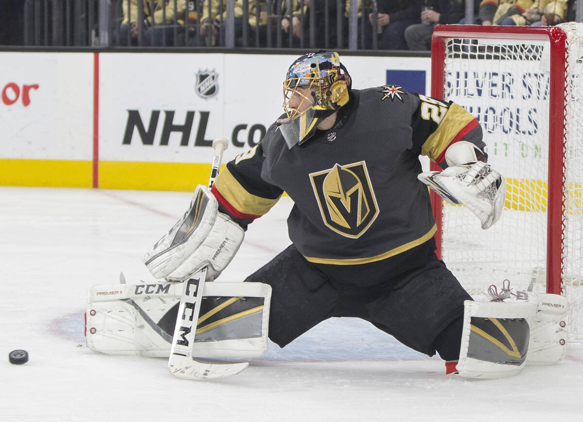 Golden Knights goaltender Marc-Andre Fleury (29) makes a save in the second period during their ...