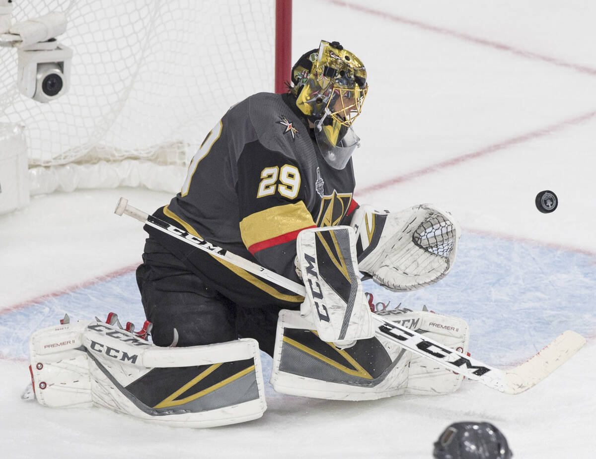 Golden Knights goaltender Marc-Andre Fleury (29) makes a save in the third period during Vegas' ...