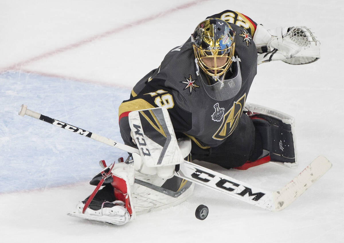 Golden Knights goaltender Marc-Andre Fleury (29) makes a save in the third period during Game 2 ...