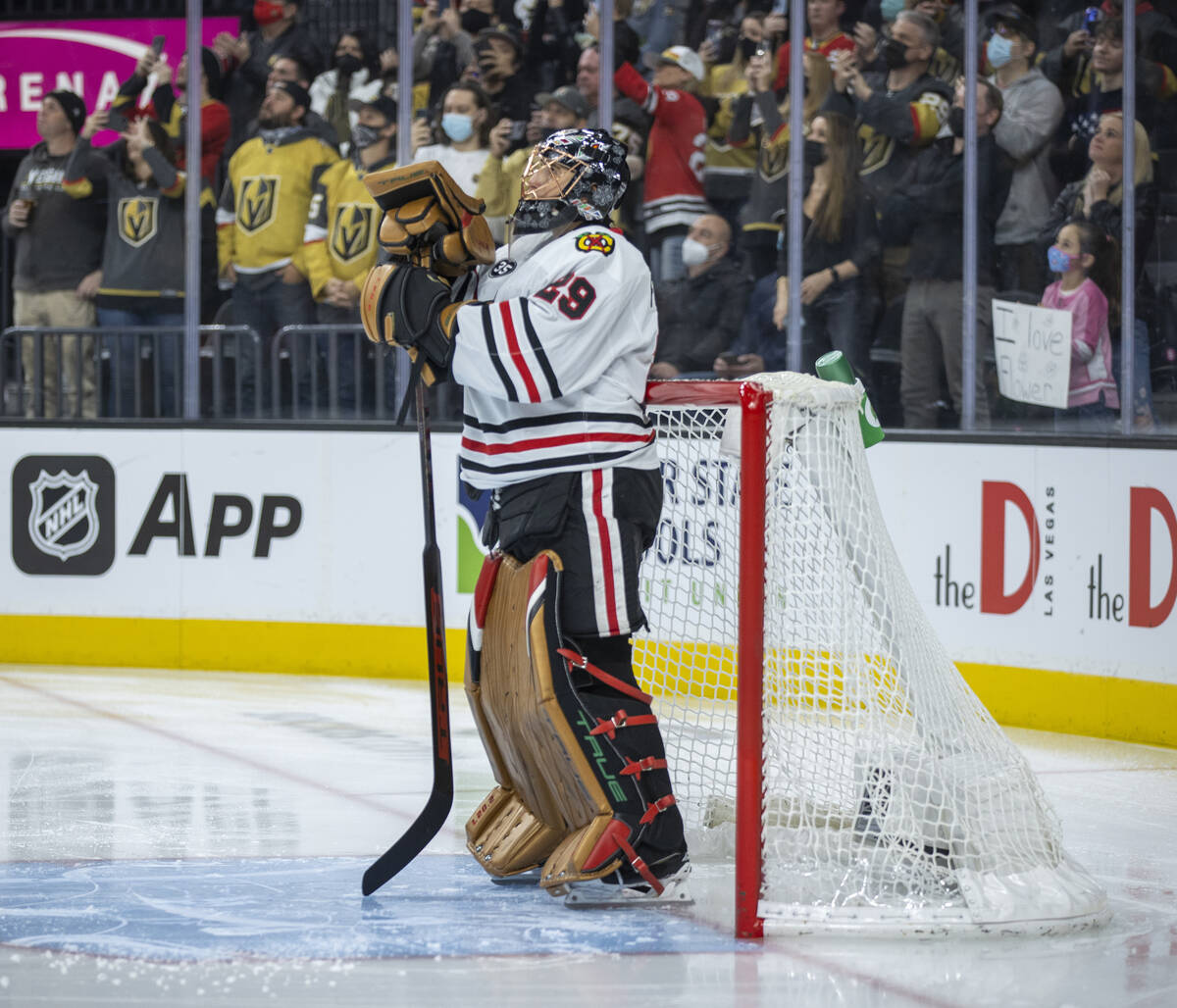 Chicago Blackhawks goaltender Marc-Andre Fleury (29) watches video in his honor before the star ...