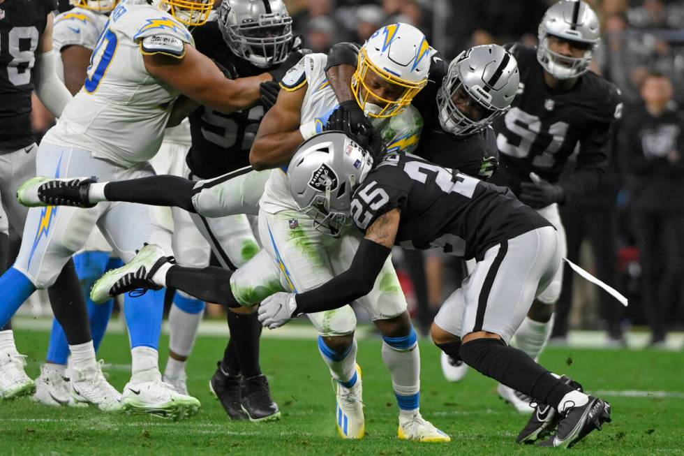 Las Vegas Raiders free safety Trevon Moehrig (25) and Las Vegas Raiders linebacker Divine Deabl ...