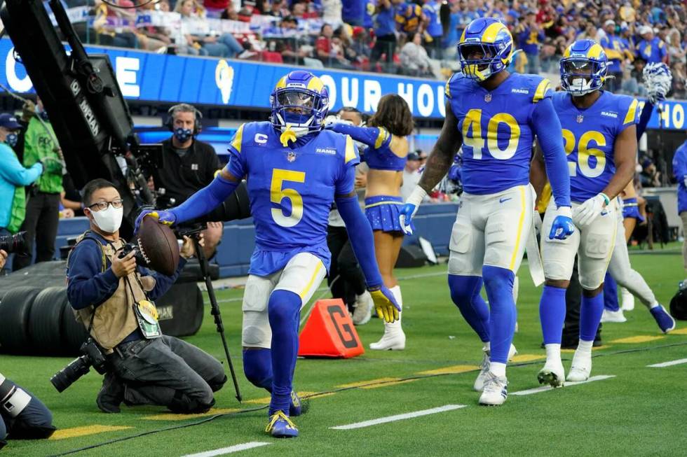 Los Angeles Rams cornerback Jalen Ramsey (5) celebrates after intercepting a pass during the se ...