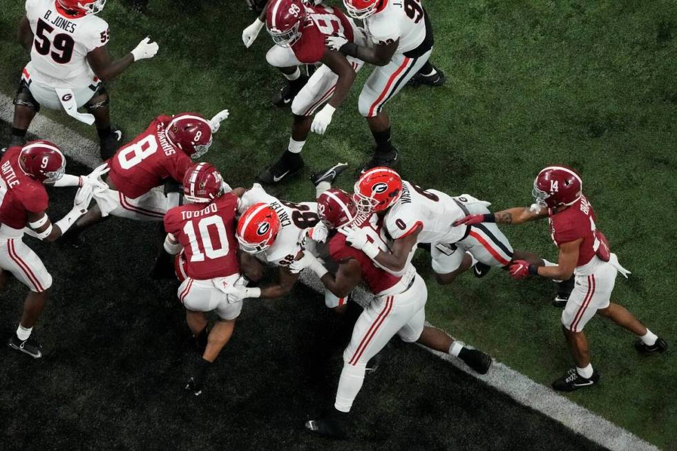 Georgia's Zamir White runs for a touchdown during the second half of the College Football Playo ...