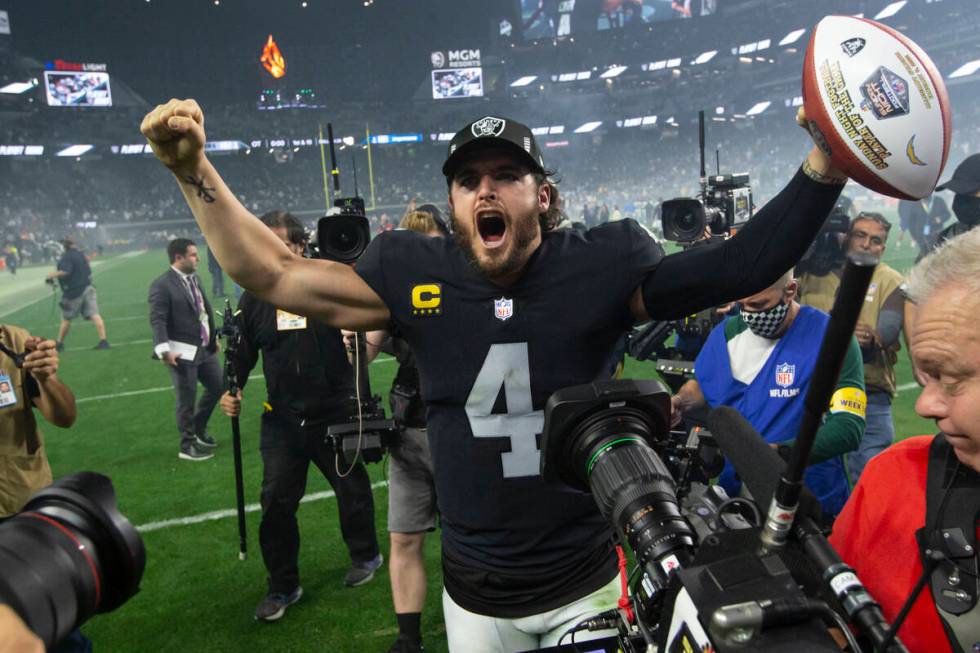 Raiders quarterback Derek Carr celebrates the team’s overtime win against the Los Angele ...