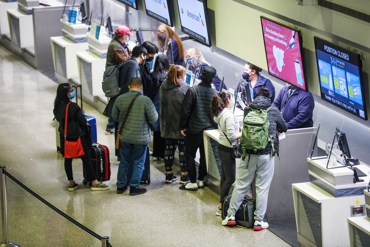 Guests in the ticketing area of Harry Reid International Airport on Monday, Jan. 10, 2022 in La ...
