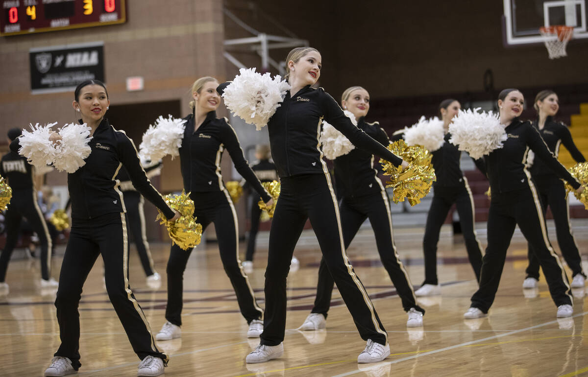 The Desert Oasis dance team performs at halftime during a girls high school basketball game aga ...