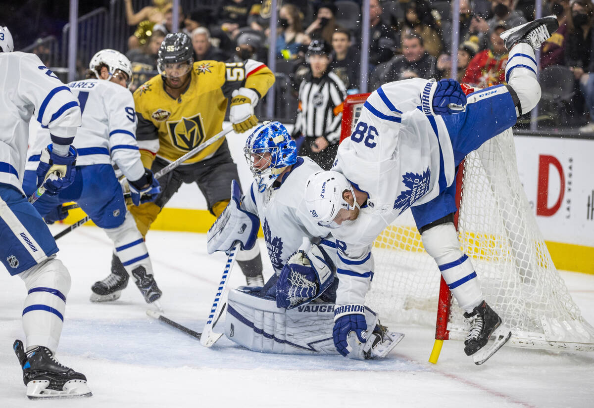 Toronto Maple Leafs goaltender Jack Campbell (36) defends the net from the Golden Knights as To ...