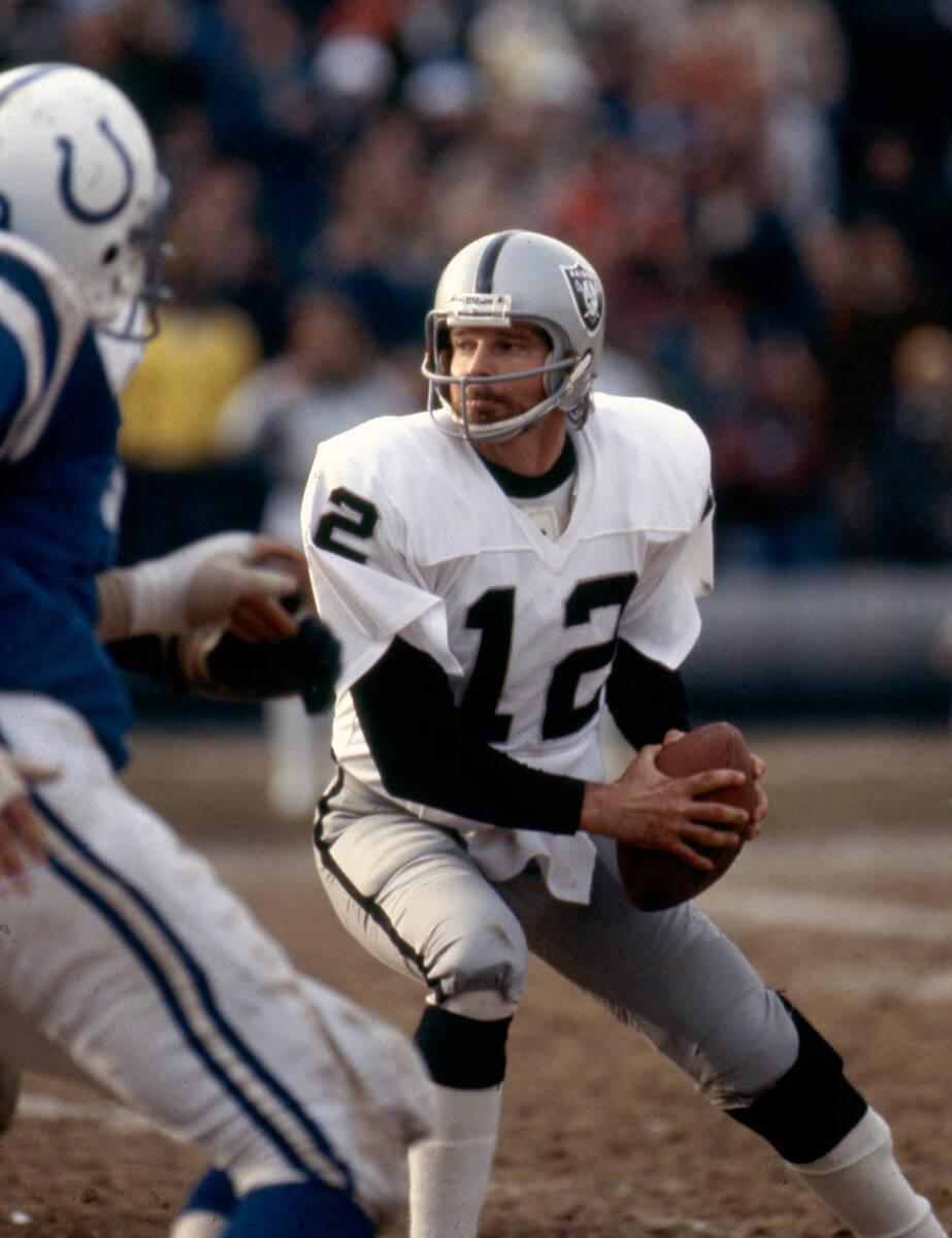 Oakland Raiders quarterback Ken Stabler (12) looks to pass during an NFL game against the Balti ...