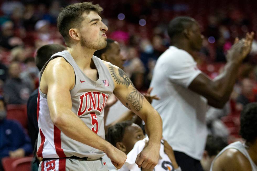 UNLV Rebels guard Jordan McCabe (5) reacts to his team scoring against the New Mexico Lobos dur ...