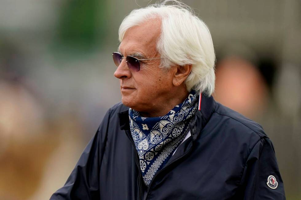 In this April 28, 2021, file photo, horse trainer Bob Baffert watches workouts at Churchill Dow ...