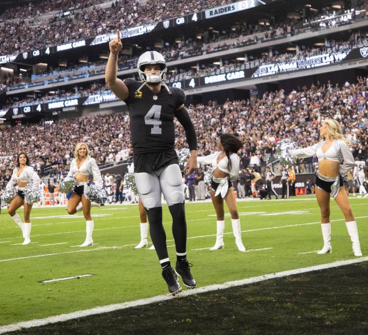 Raiders quarterback Derek Carr (4) salutes the crowd after being announced before the start of ...