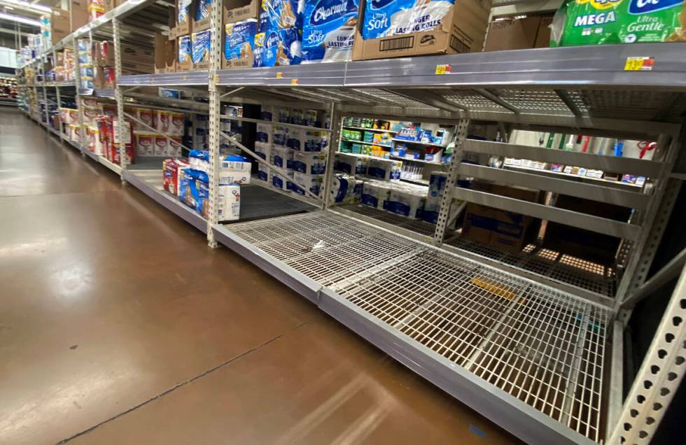 Some toilet paper products are running low on the shelves at the Walmart on West Lake Mead Boul ...